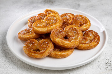 Tasty French Palmier Cookies Pastry. Palmiers or elephant ears.