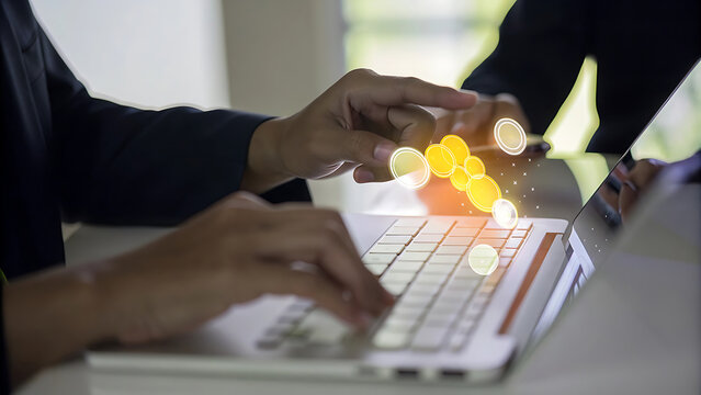 Hands typing with glowing futuristic business intelligence dashboard for data driven strategy