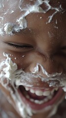 Joyful Cream-Covered Face - A Moment of Pure, Unadulterated Laughter.