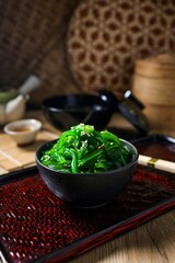 Seaweed salad,wakame salad, chuka wakame in black bowl