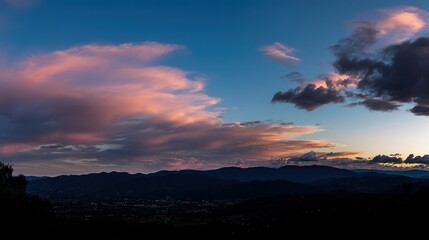 Fototapeta premium peace. A breathtaking sunset sky panorama with vibrant warm hues and glowing clouds. inspiring travel planning, travel magazines, designed for travel destination branding, inspires travel planning.