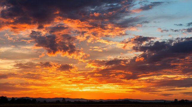 peace. A breathtaking sunset sky panorama with vibrant warm hues and glowing clouds. inspiring travel planning, travel magazines, designed for travel destination branding, inspires travel planning.