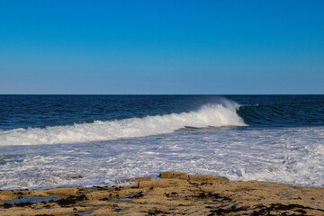 Crashing Ocean Wave on a Rocky Shore