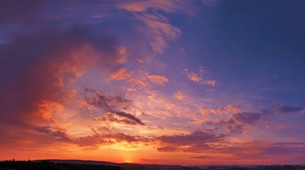 Fototapeta premium peace. A breathtaking sunset sky panorama with vibrant warm hues and glowing clouds. inspiring travel planning, travel magazines, designed for travel destination branding, inspires travel planning.