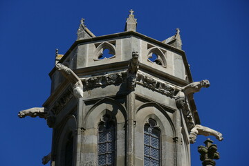 Gothic medieval stone church tower with gargoyles on each corner. Basilique Saint-Nazaire, Carcassonne, France.