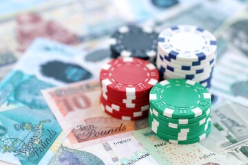 Egyptian pound currency money bills and bunch of casino chips. The concept of gambling and casino