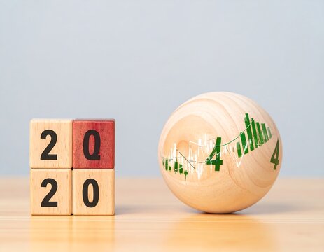 Wooden blocks and a ball, financial data