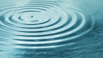 Blue Water Ripple Effect with Expanding Waves on Liquid Surface in Tranquil Abstract Background