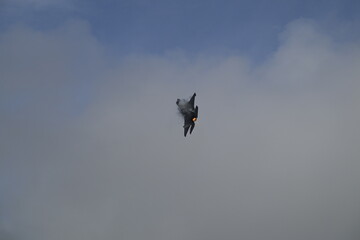 Jet hitting afterburners vapor trail