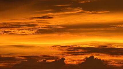 Fototapeta premium peace. A breathtaking sunset sky panorama with vibrant warm hues and glowing clouds. inspiring travel planning, travel magazines, designed for travel destination branding, inspires travel planning.