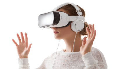 Woman experiencing virtual reality with headset and headphones, hands raised in excitement.
