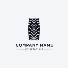 A minimalist black and white logo featuring a tire tread pattern above the text 