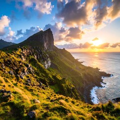 Dramatic mountain sunset over ocean