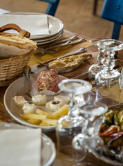 Casu Marzu, Sardinian cheese with larvae of Piophila Casei, served on a traditional Sardinian table together with other local and artisanal products