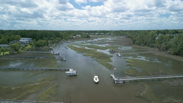 Expensive boat in low country marsh during the day