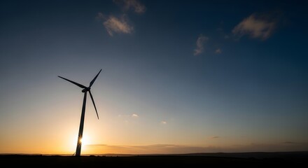 Blue sky with wind turbine silhouette symbolizing sustainability and ozone protection