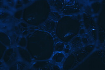 Abstract background, foamy moisture, soap bubbles on a yellow background