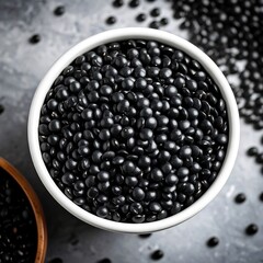 Black lentils in a white bowl