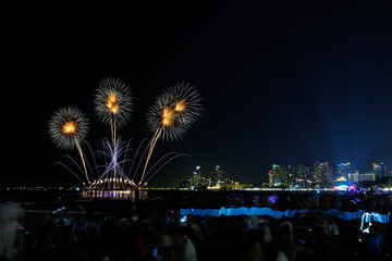 PATTAYA, THAILAND, Real Fireworks at Pattaya bay, Pattaya national Fireworks Festival contest, November of every Year, Beautiful of bright light fireworks Show in middle sea, for postcard wallpaper