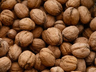 Background of organic walnuts. Close-up