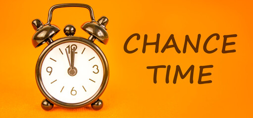 Chance time symbol. Concept word Chance time on beautiful orange paper. Beautiful black alarm...