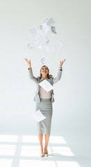 Fototapeta premium Woman Throwing Paper Money in Air