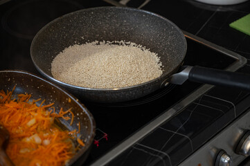 Sesame Seeds Roasting in Frying Pan