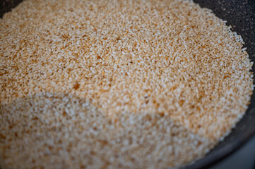 Sesame Seeds Roasting in Frying Pan