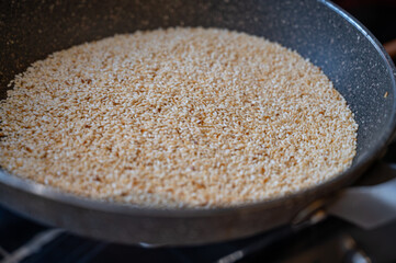 Sesame Seeds Roasting in Frying Pan