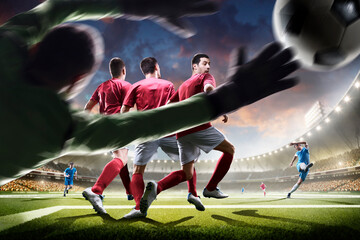 Soccer. Professional soccer players in action. Tackling the ball. Soccer championship. Soccer arena full of fans. Sports concept. Sunset on stadium