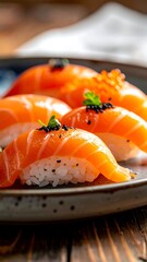 Fresh salmon nigiri on a plate