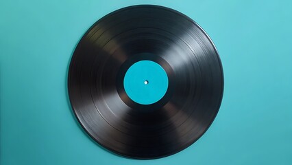 Obraz premium Vintage Vinyl Record with Teal Label on a Teal Background