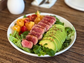 Tuna salad with avocado and tomatoes