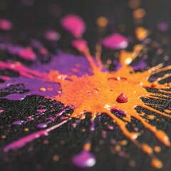 Abstract paint splatter on black surface