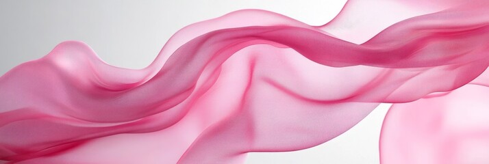 Flowing pink fabric drapes gracefully across a soft background, creating an elegant and ethereal atmosphere, showcasing the beauty of texture and movement in design