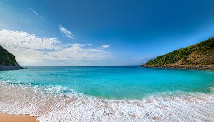 Fototapeta premium Serene Shoreline Calm Turquoise Waters Gently Meet The Sandy Beach