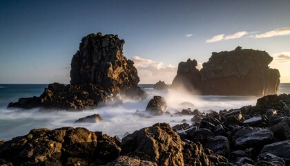Dramatic coastal rocks at sunrise