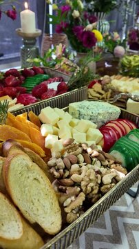 Gourmet Cheese and Crackers Platter with Fresh Herbs