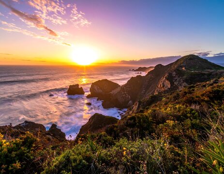 Coastal sunset over rugged cliffs - Powered by Adobe