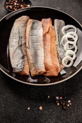 Herring fillet fish fresh seafood portion size natural product tasty snack fresh delicious gourmet food background on the table rustic top view copy space pescetarian diet