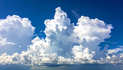 Dramatic cumulus clouds against a vibrant blue sky (1)