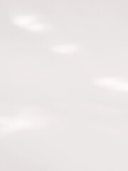 Soft Light and Shadows on a White Surface