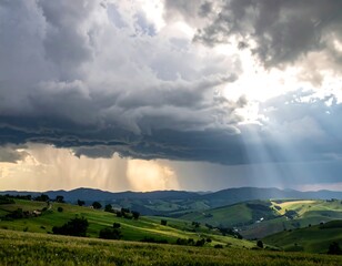 Dramatic landscape with stormy clouds and sunbeams