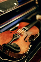 Fototapeta premium Violinist performing during Catholic church ceremony, classical music performance close-up view