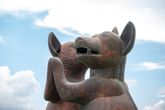 traffic circle of the dancing dogs, statue of Pre columbian Clay Dog Sculpture from Mexico, perritos bailarines, Colima, Mexico, October 2, 2024. colimotes, tlalchichis. artist Guillermo R&iacute;os Alcal&aacute;.