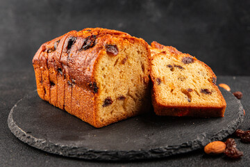 Fruit cake sweet pastry fruitcake dessert dried fruits, nuts traditional baked goods natural product tasty snack fresh delicious gourmet food background on the table rustic top view copy space