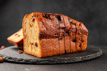 Fruit cake sweet pastry fruitcake dessert dried fruits, nuts traditional baked goods natural product tasty snack fresh delicious gourmet food background on the table rustic top view copy space