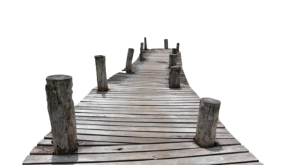 Weathered Pier: A detailed and photorealistic view of a weathered wooden pier, its aged planks and sturdy posts evoking a sense of nostalgia and serenity.