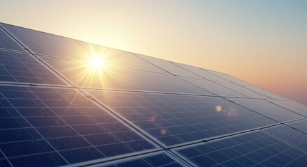 Golden sunbeams reflect on a solar panel during a beautiful sunset over a clear sky