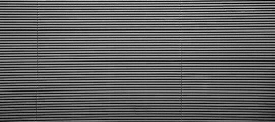 Obraz premium Iron Grille wall Aluminum louver shutters form the dusty surface or background. Curtains made of aluminum grid. Metal grating.Metal structure. Detail texture.Background.Chrome wall. abstract pattern.